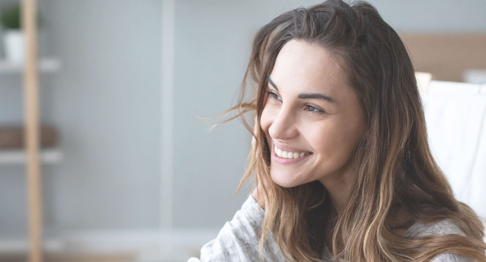 Smiling woman looking off to the side