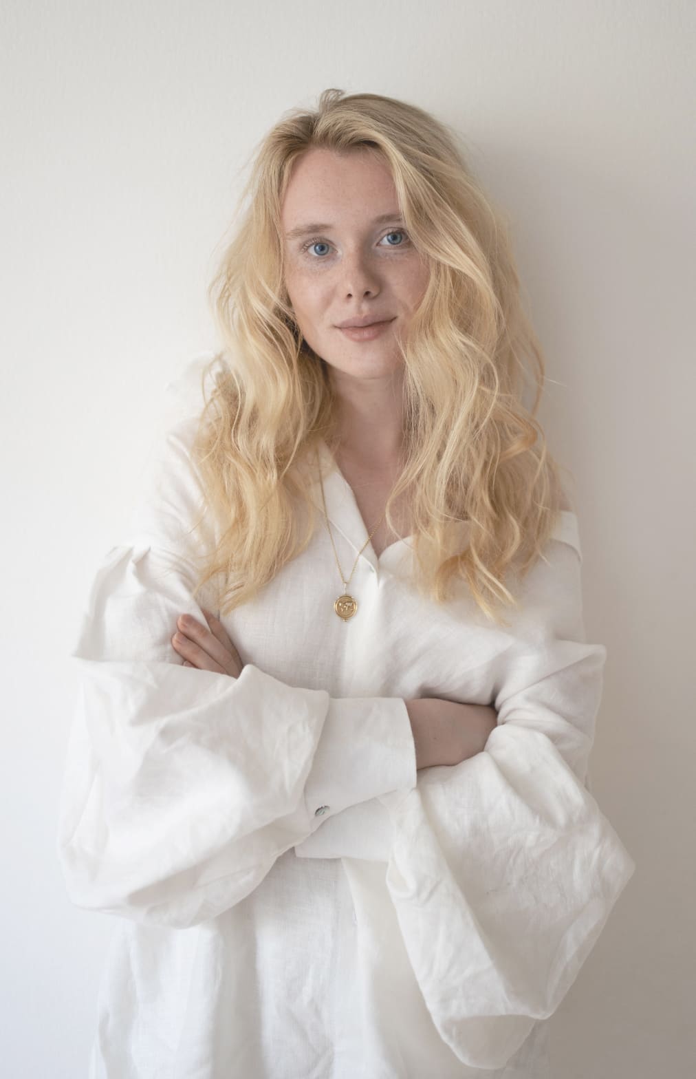 Blonde woman wearing a white shirt