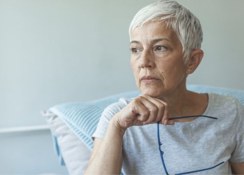 Older woman experiencing chronic pelvic pain
